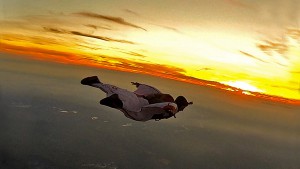 Leo Ray flys with the Wing Suit in the last sunlight - Pic: Renaud Vidal