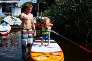 Family life - Klaas and his son Tebbe play together on the water (Pic: Femke Geestmann)