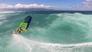 Tatiana Howard rides a big wave during the Aloha Classic 2016