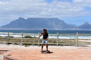 Dudu Levi on his Skateboard just in front of the famous tTable Mountain in Cape Town